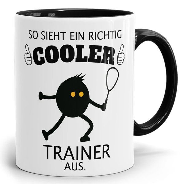 Zweifarbige Kaffeetasse "Cooler Trainer" schwarz/weiß